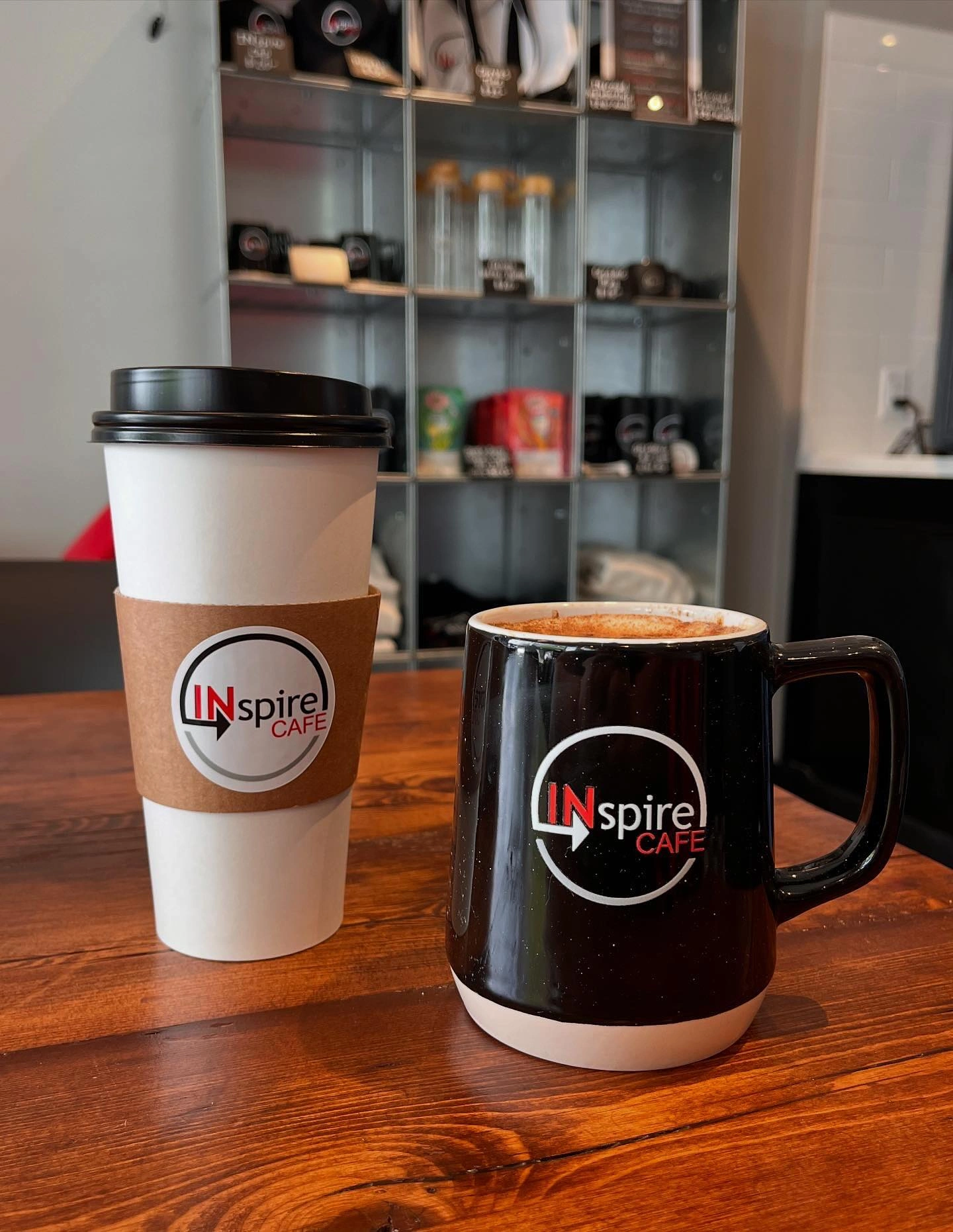 INspire Cafe branded coffee cups